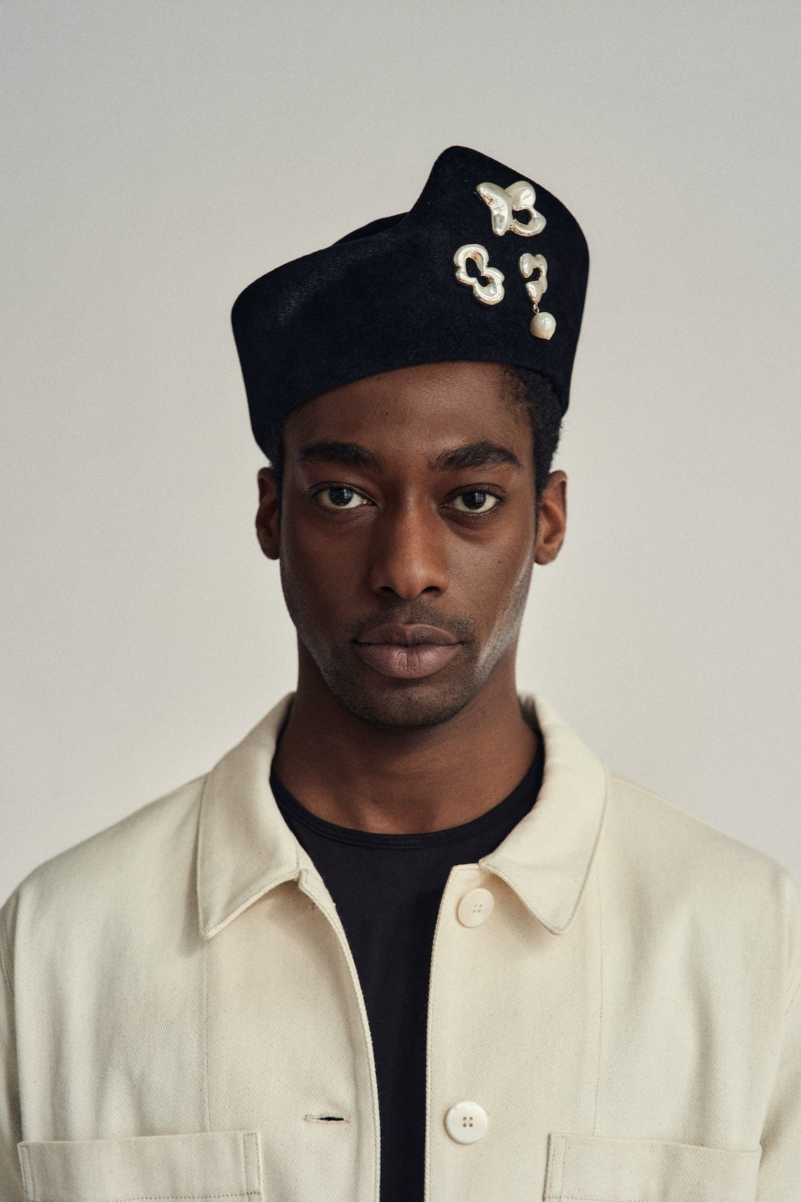 Ridge felt hat in black by heirloom hats with Seola silver brooches collab made in Montreal Canada