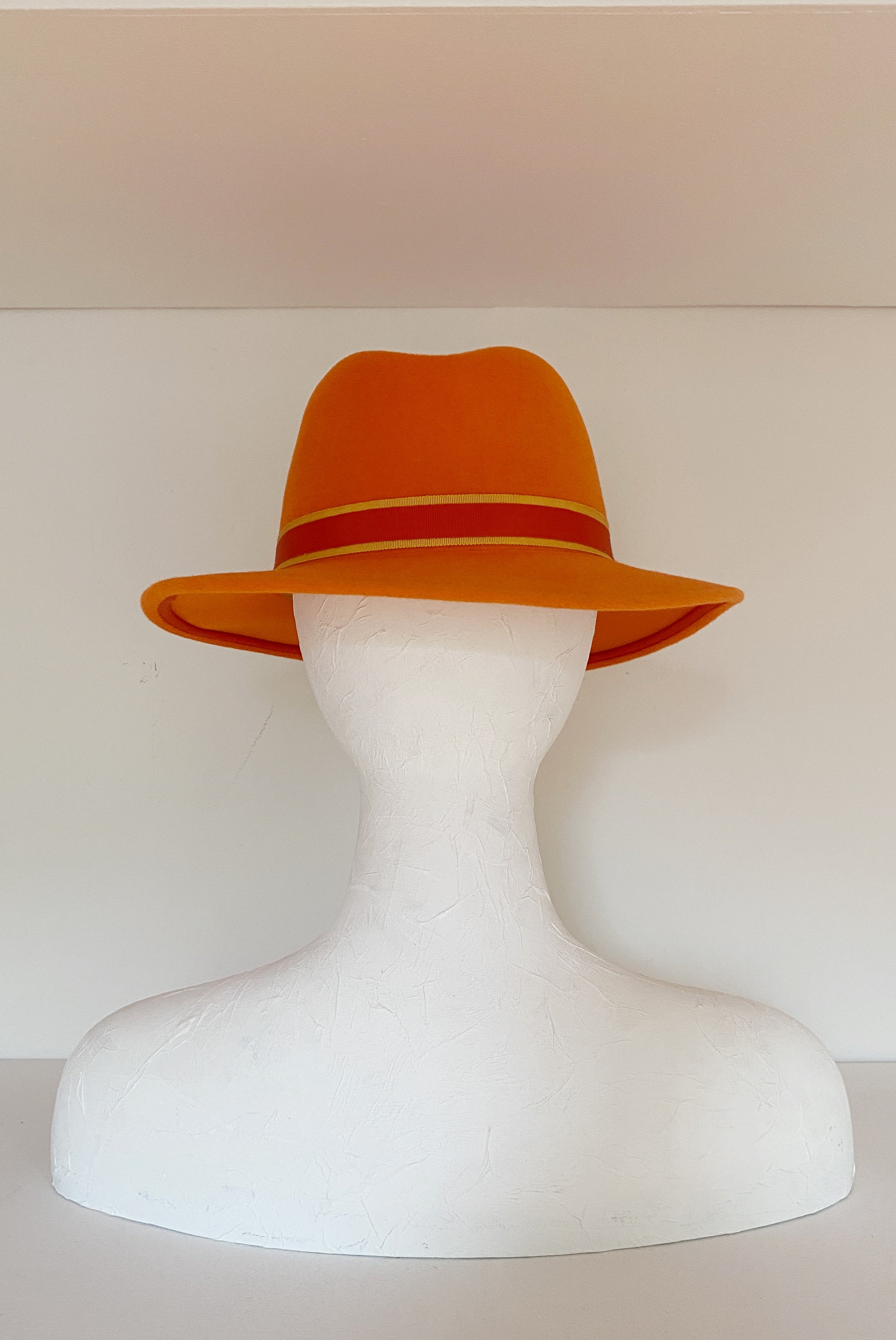 Bright orange fedora with yellow and orange trims (SIZE MEDIUM)